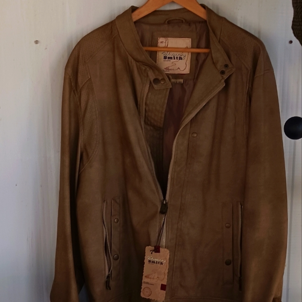 Med tan color Faux leather jacket. XL .